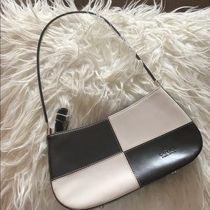 authentic Gucci black and white handbag.